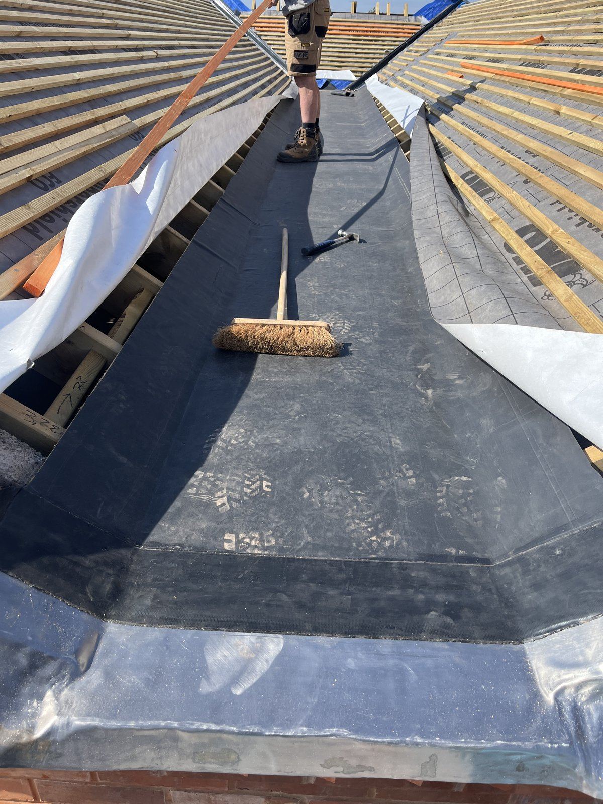 Re-roof with lead valleys and chimney flashings