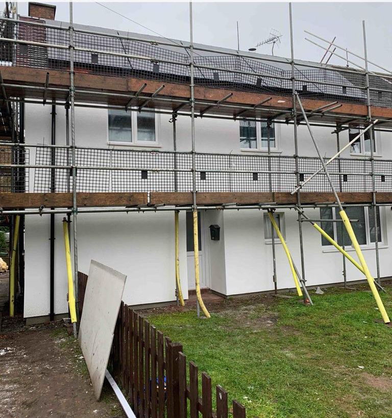 Scaffold erected to the side elevation of a two-storey building