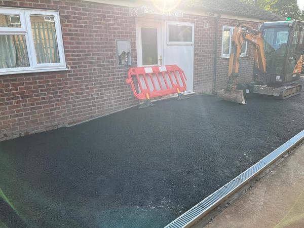 Tarmac frontage with new channel drainage
