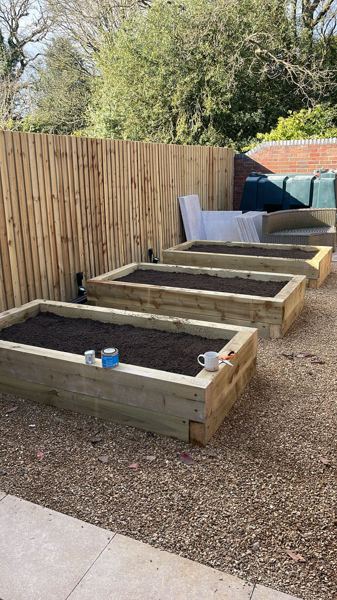 Lichfield garden transformation: sandstone paving, sleeper beds, gravel and hardwood pergola – Staff4dshire Properties
