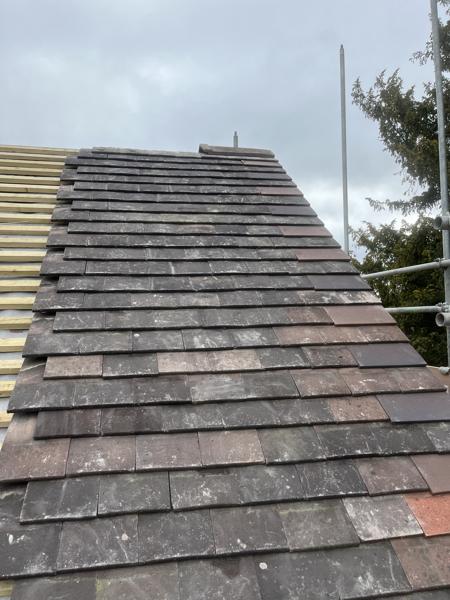 Plain clay tile pitched roof under construction – Staff4dshire Roofing Specialists