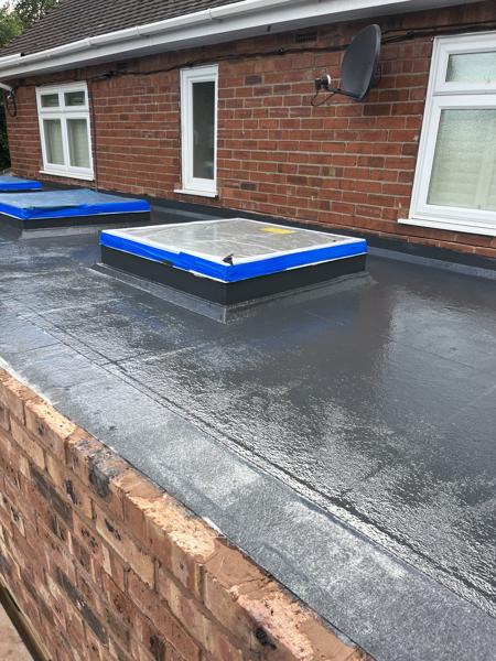 GRP fibreglass flat roof with roof lanterns