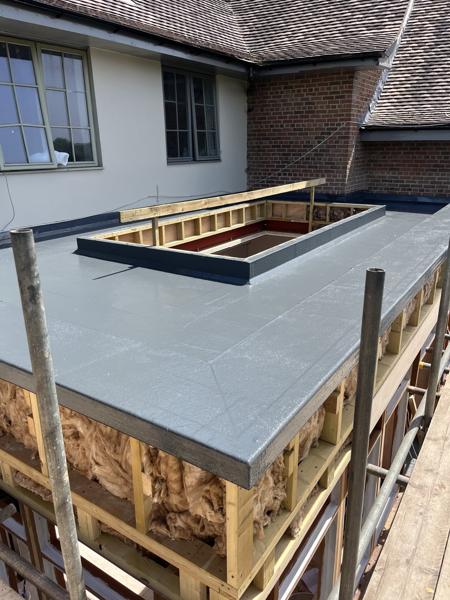 GRP fibreglass flat roof with roof lanterns on an extension – Staff4dshire Roofing Specialists