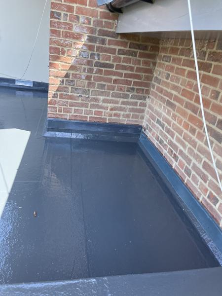 GRP fibreglass flat roof with roof lanterns on an extension – Staff4dshire Roofing Specialists