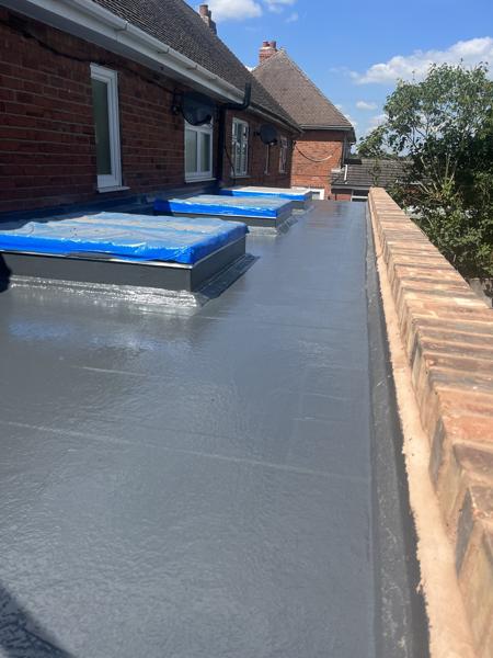 GRP fibreglass flat roof with roof lanterns on an extension – Staff4dshire Roofing Specialists