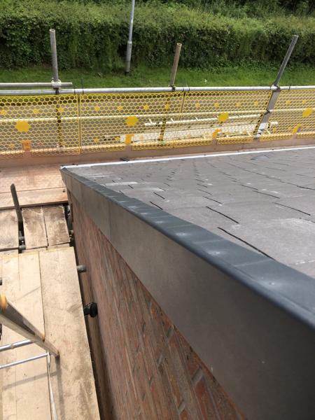 Flat roof edge trim on an extension – Staff4dshire Roofing Specialists