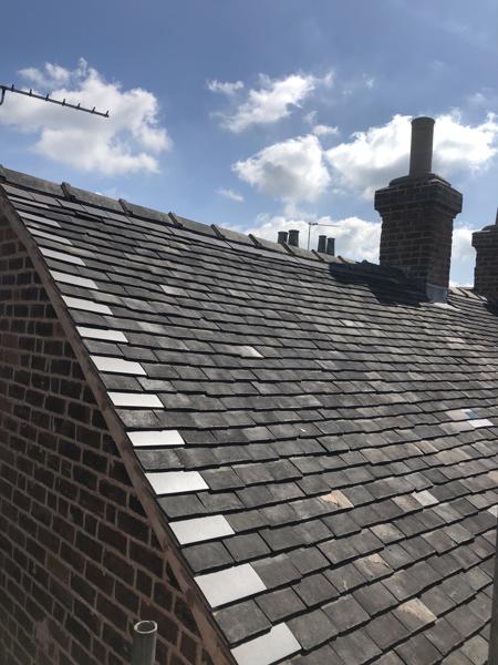 Re-roofed terrace in clay tiles with scaffold access
