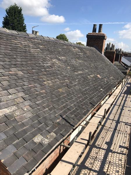 Re-roofed terrace in clay tiles with scaffold access