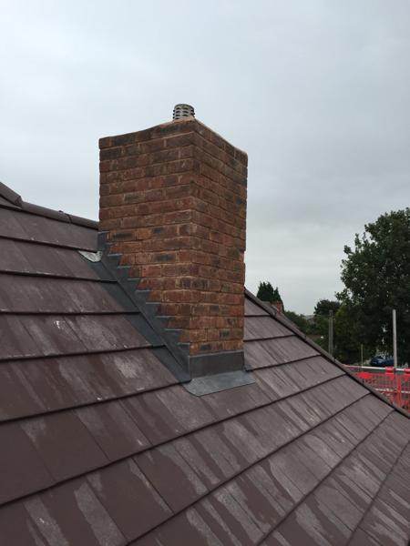 New chimney flashing and tiled roof