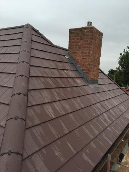 New chimney flashing and tiled roof
