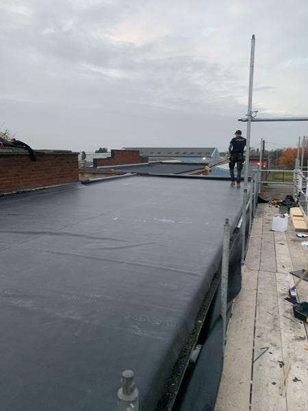 New EPDM rubber flat roof on a commercial building