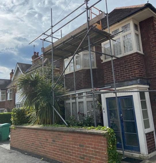 Scaffold to the front elevation of a semi-detached house