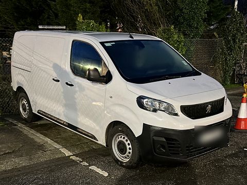 White Peugeot van, front three-quarter view